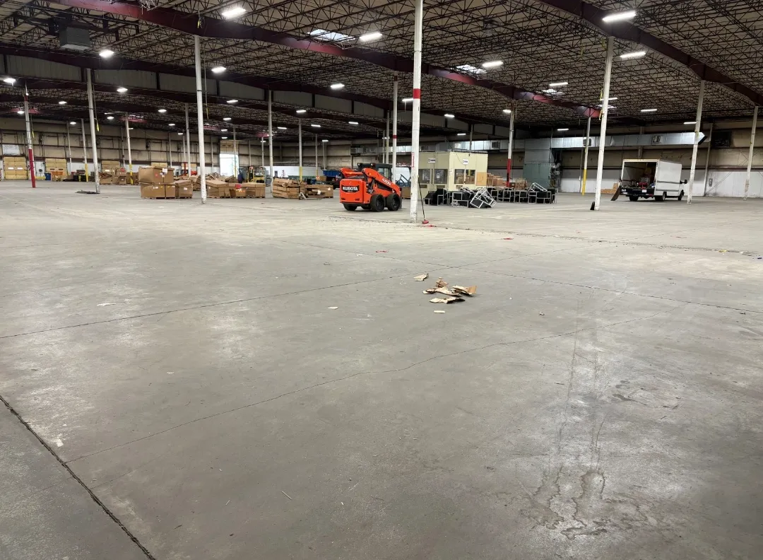 Large warehouse floor with AES equipment in the distance